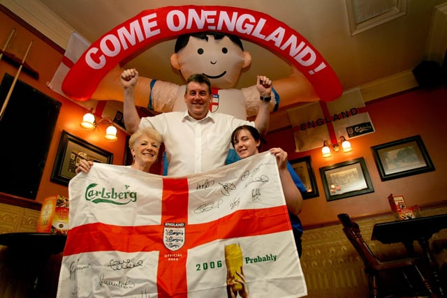 The landlord and staff at the Fountain Inn who were pictured supporting England in 2006, complete with a 10ft tall inflatable fan.