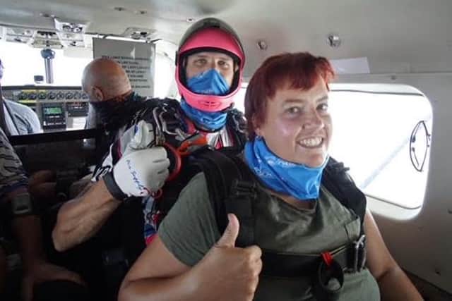 Thumbs up and all set for the big jump -- Lyndsey Allen on her skydive.
