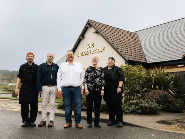 Members of staff are all smiles at the fresh new look.