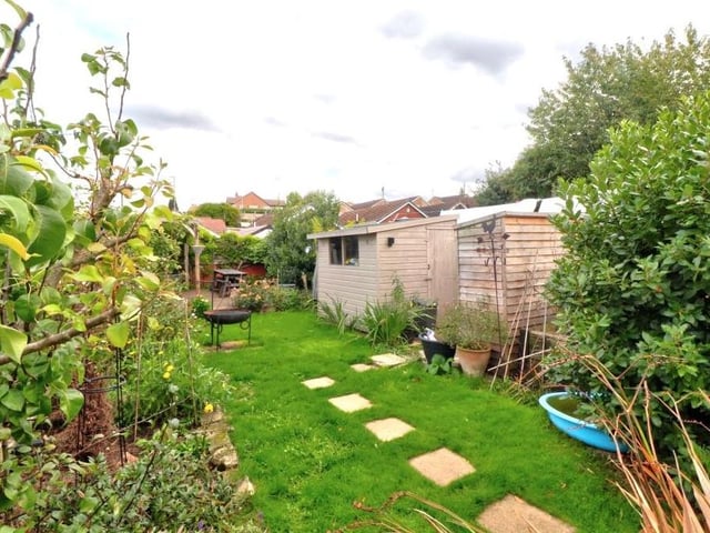Imagine letting yourself loose on this exciting garden! You could do so much to put your own stamp on it.