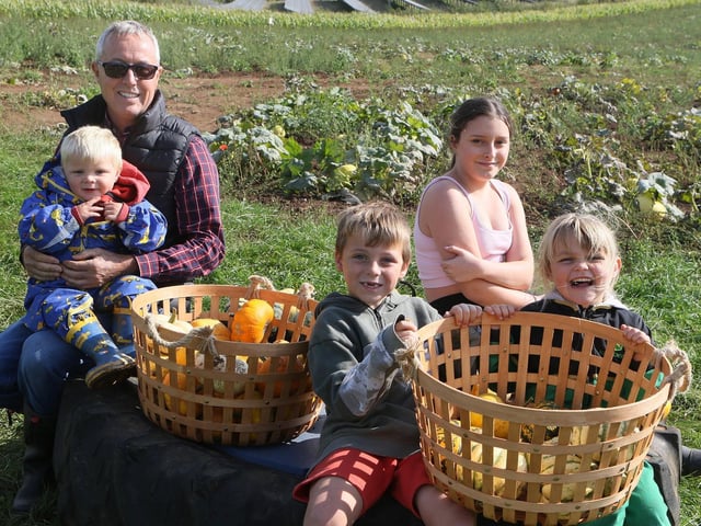 Mark Holdsworth with his family of young helpers; Henry, Oliver, Poppy and Scarlet.