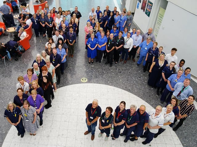 Staff at King's Mill Hospital are pictured celebrating 75 years of the NHS