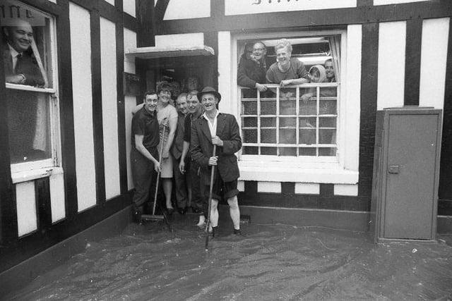 People still visited the pub despite the flooding.