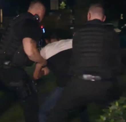 Officers from Nottinghamshire Police arrest Klayton Smith. Picture: Notts Police