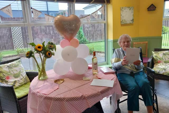 On her birthday, Joan was showered with cards, gifts, and love.
