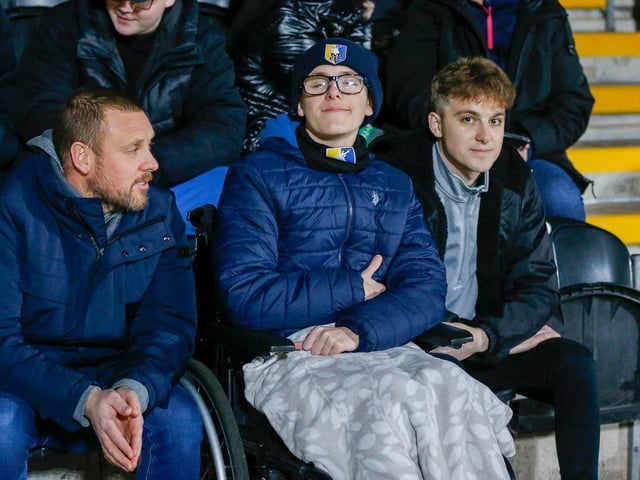 Some of the Mansfield Town fans who headed to Burton for the EFL Trophy defeat.