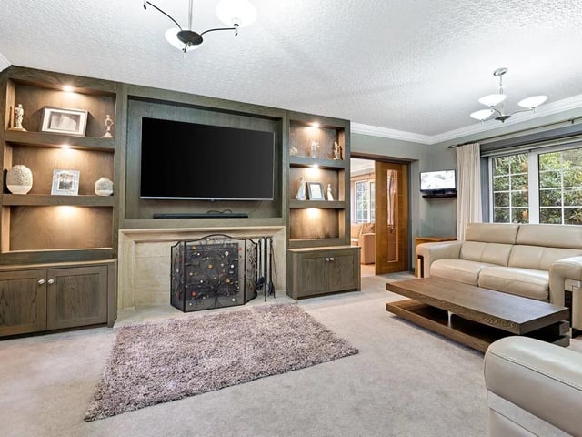 This is a space that feels separate from the main hub of the house — perfect for film nights, reading, or simply unwinding.