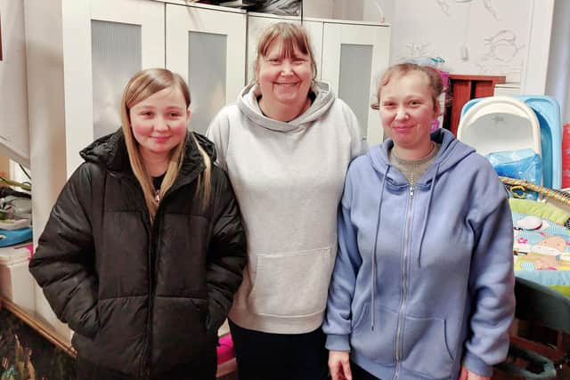Ashfield Furniture Project volunteers are busy preparing for the launch, from left: Lexey Bramwell, Margaret Smith, Chloe Smith. Photo: Submitted