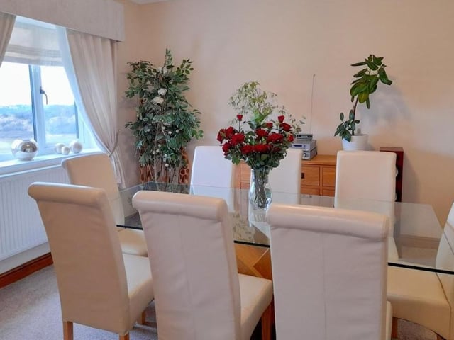 A second view of the dining room. The perfect spot for family meals or for entertaining family and friends.