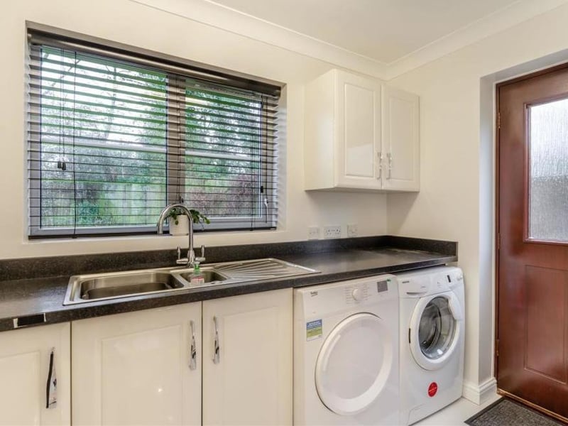 The utility area at the £450,000 property is a continuation of the kitchen/diner. It has cabinets, cupboards, a sink and work surfaces. There is also space and plumbing for a washing machine and an American-style fridge/freezer, plus space for a tumble dryer.