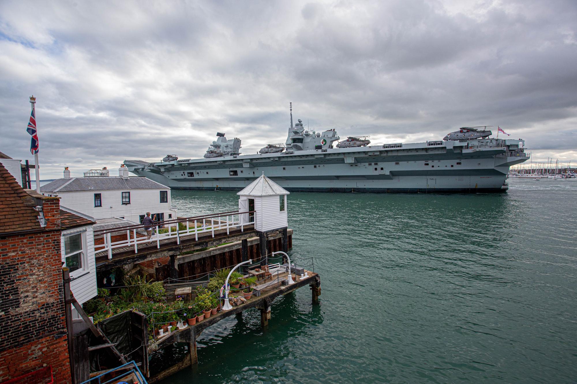 Pictured: HMS QE as it passes The Point, Old Portsmouth. View from Sill & West pub. Picture: Habibur Rahman
