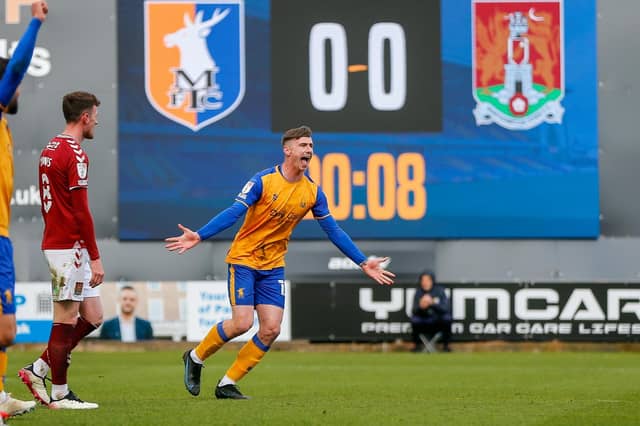 Oli Hawkins celebrates his winner against Northampton Town FC in April.