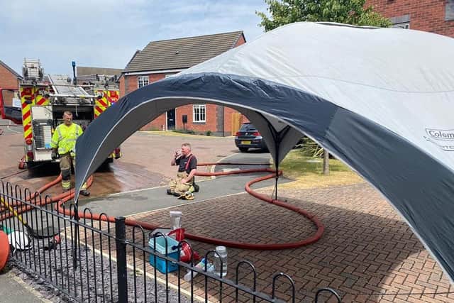 Residents on Wessex Drive provided a shelter from the sun and drinks for the firefighters.