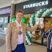 New Mansfield Starbucks in Four Seasons. Mansfield Mayor Andy Abrahams and Starbucks district manager Anne Coleman.
