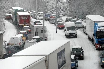 Traffic backs up after a heavy snowfall in Mansfield in 2010.