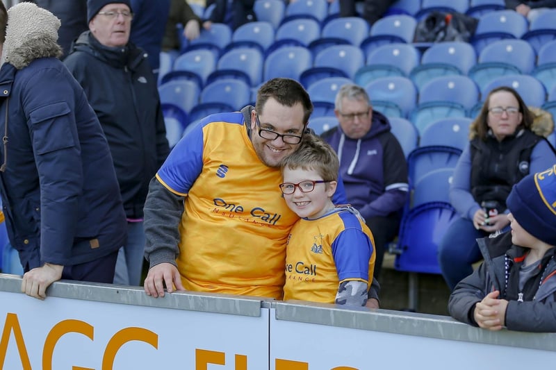 Mansfield Town fans ahead of kick-off against Rochdale on 10 April 2023.