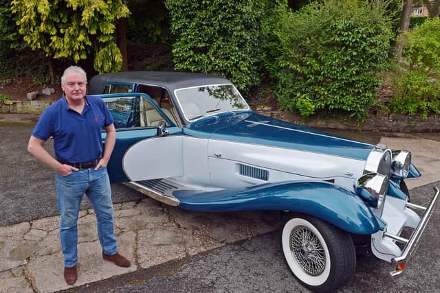Car collector Peter Mayo with a Panther DeVille, similar to car he sold to the makers of Cruella.