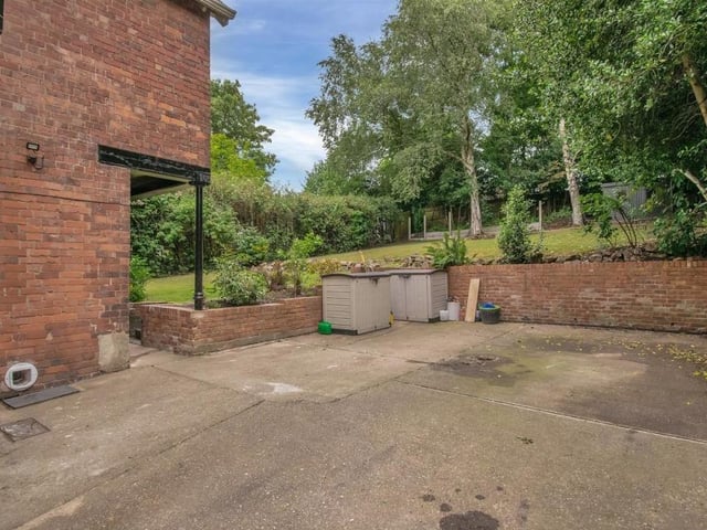 Norfolk House sits on a plot of land spanning more than a quarter of an acre. There is so much space, with gardens at front and back, as well as off-street parking. A hard-standing patio runs the full width of the property and a long driveway leads up the side of the house to the back garden.