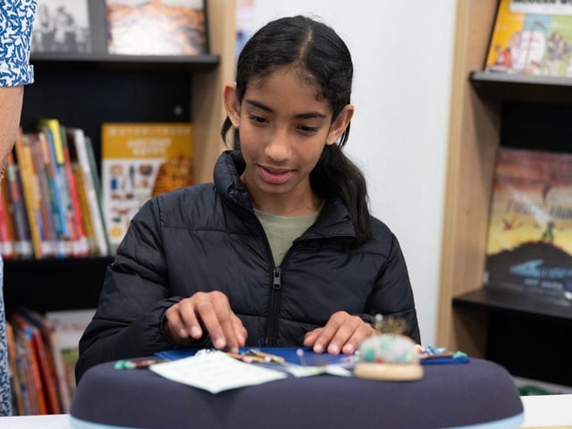 Hands on Heritage gave visitors the opportunity to try out heritage crafts including book binding, and bobbin lace making.
