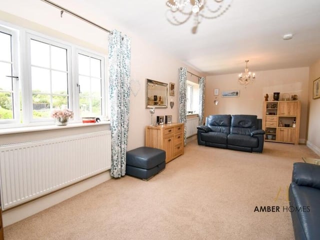 A second shot of the sitting room on the ground floor of the £450,000 Selston property. It offers a perfect balance between sophistication and functionality.