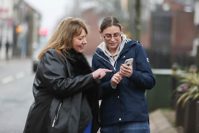 Caroline Henry, Nottinghamshire police and crime commissioner, left, and Coun Helen-Ann Smith, Ashfield Council deputy leader, trialling the Safer Streets app.