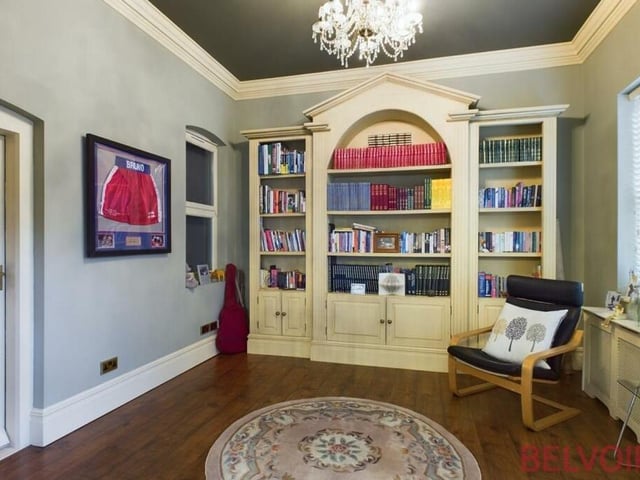 This beautiful library adds considerable class and character to the £795,000 property. Custom-fitted, with two sides of book shelves and cupboards, it can be used as a home office or as a tranquil escape.