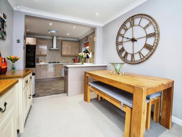 Attached to the kitchen is this well-presented dining area, which is ideal for meals or for entertaining friends.