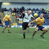 Simon Coleman battles for the ball at Field Mill in 2002