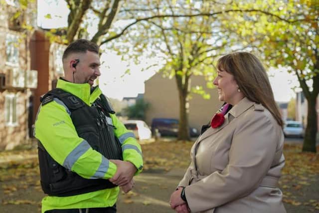 Caroline Henry, Nottinghamshire police and crime commissioner, with a Nottinghamshire Police officer.