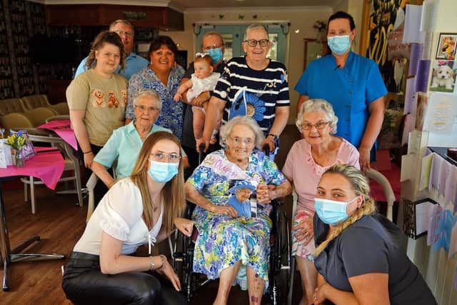 Woodlands care home resident Audrey Cheesbrough celebrates her 100th birthday. Seen with residents, friends and staff.