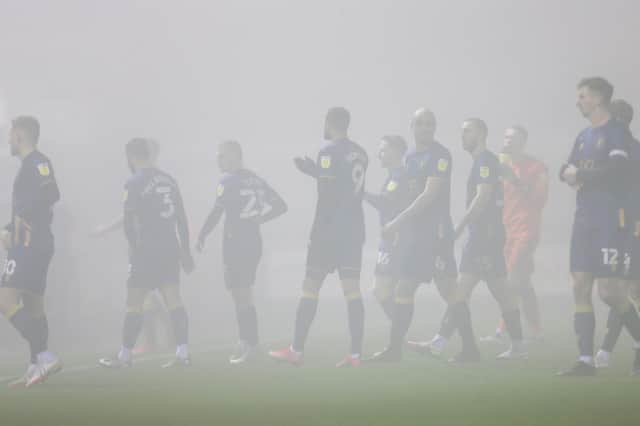 Stags players leave the pitch after tonight's abandonment. Photo by Chris Holloway / The Bigger Picture.media