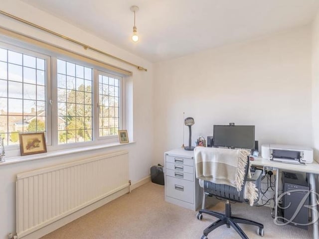 As you can see, the fifth bedroom, which overlooks the front of the house, can easily be converted into a home office or study.