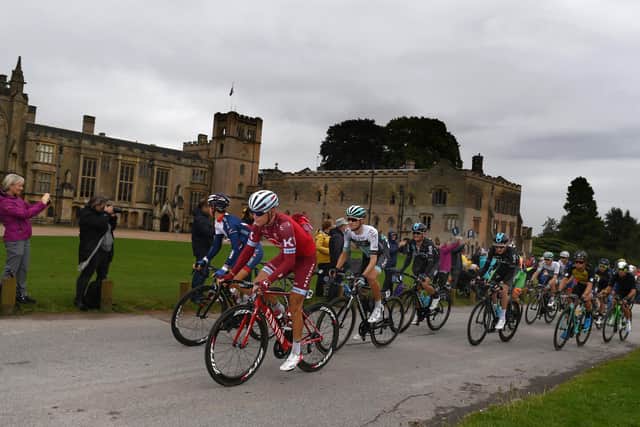 Riders pass Newstead Abbey on the 14th Tour of Britain in  2017.