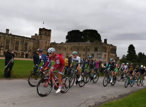 Riders pass Newstead Abbey on the 14th Tour of Britain in  2017.