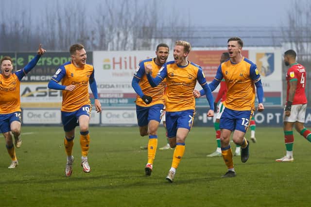The team celebrate Harry Charsley's goal against Walsall. Photo by Chris Holloway / The Bigger Picture.media