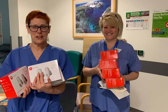 King's Mill Hospital staff pictured receiving the baby monitors donated by members of the Mansfield & Ashfield Area Support Group
