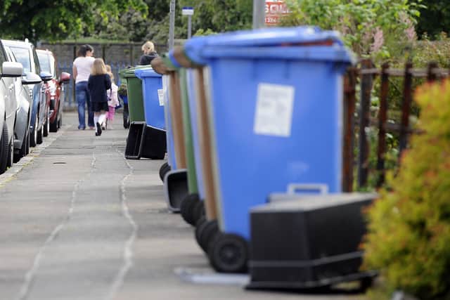 Bin collection staff are considering industrial action in a row over pay.