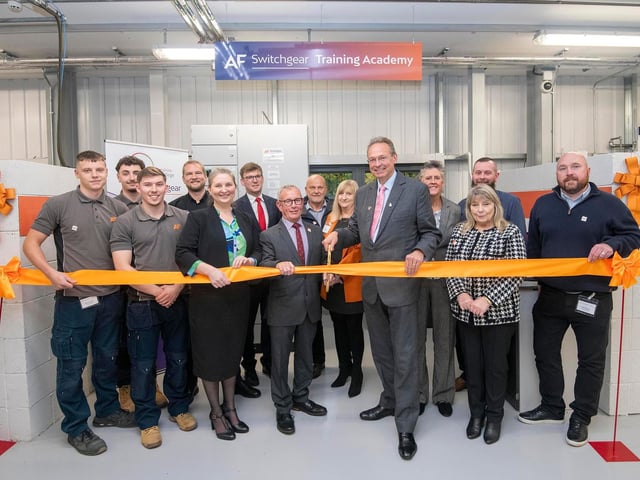 The ribbon cutting of the AF Switchgear Academy with Mike Ratcliffe and Andrew Cropley ready to cut