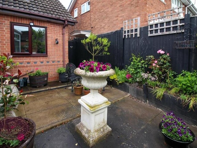 A pretty corner of the garden at the back of the £450,000-plus Laverock Close property.