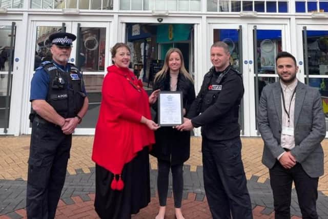 The work forms part of a Safer Streets partnership involving Police and Crime Commissioner Henry, Ashfield District Council, Nottinghamshire Police and Nottinghamshire County Council and other safety partners.
(L-R):  PCSO Steve Timperley, Commissioner Henry, Chloe O'Donnell (Idlewells Centre Manager), Inspector Mark Dickson and Antonio Taylor (Community Safety Manager at Ashfield District Council)
