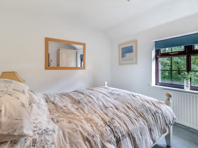 Let's look at the other three bedrooms on the first floor of Four Oaks, starting with this cosy one.