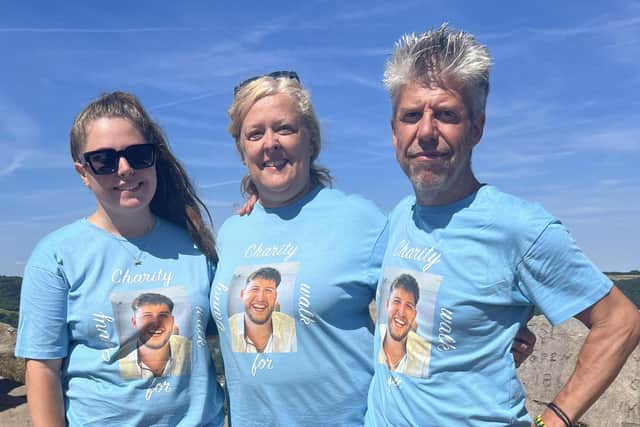 Danny's parents, Paul and Alison, are pictured with their younger daughter, Chloe. The family carried out a fundraising walk in Danny's name.