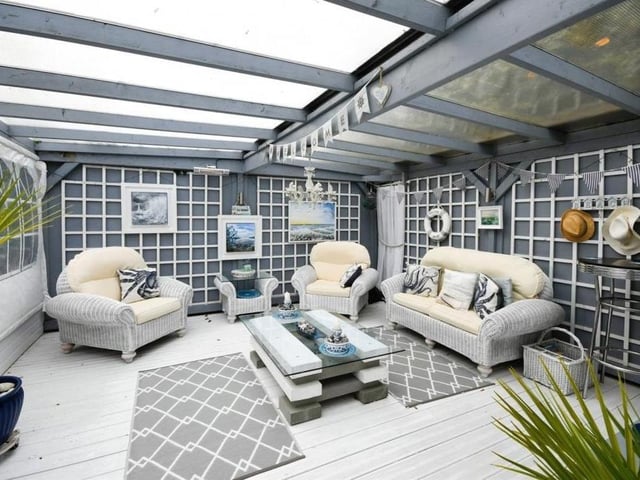 One of the most endearing aspects of the garden is this fantastic summer house, which is the ideal place to relax or entertain. It has heating, light, power, a work space and even a bar.