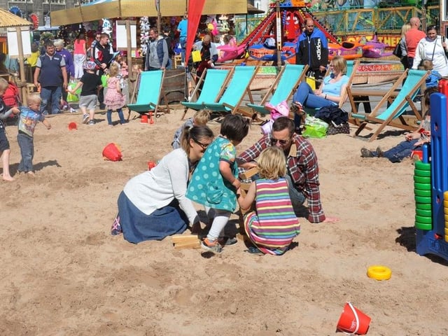 Have a ice cream while sitting on the beach in Slab Square, Nottingham, which is created every summer.