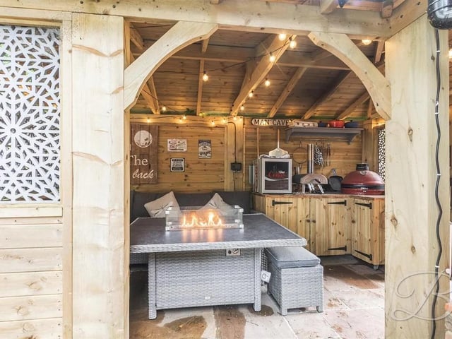 The sheltered patio with built-in BBQ provides the perfect haven to host friends and family.
