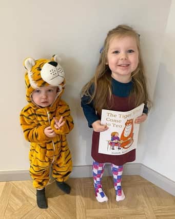 India and Raffy aged one and three, as Sophie and the Tiger from The Tiger That Came To Tea.