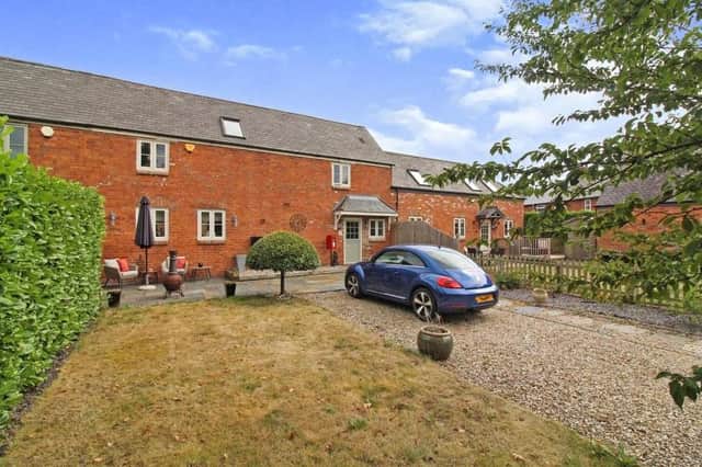 Offers in the region of £375,000 are invited by estate agents Bairstow Eves for this 'stunning' barn conversion on Cauldwell Road, Sutton.