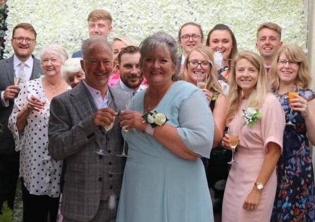 Karen and Peter married on 19.8.20. Karen said: 'When they announced that weddings could only have 12 guests, Peter decided that was perfect for us as we have 5 children between us + partners and our two mums. He proposed on 12th July and we got married on 19th August. It was the perfect day.'