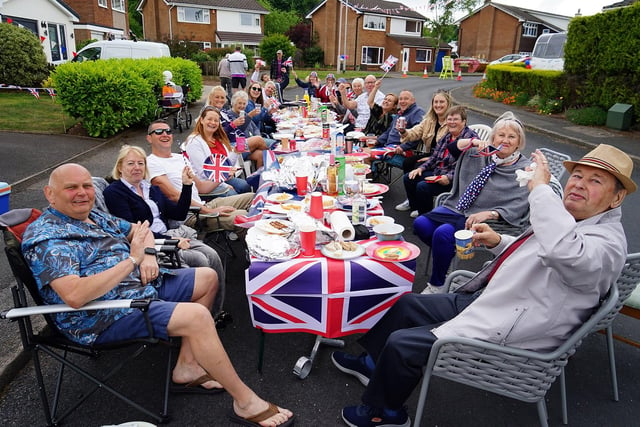 The Delamere Drive street party saw residents enjoying a meal together in front of their homes.