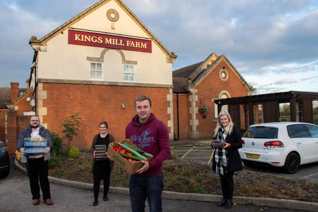 Coun Tom Hollis takes delivery of more food, helped by staff from Kings Mill Farm in Sutton-in-Ashfield